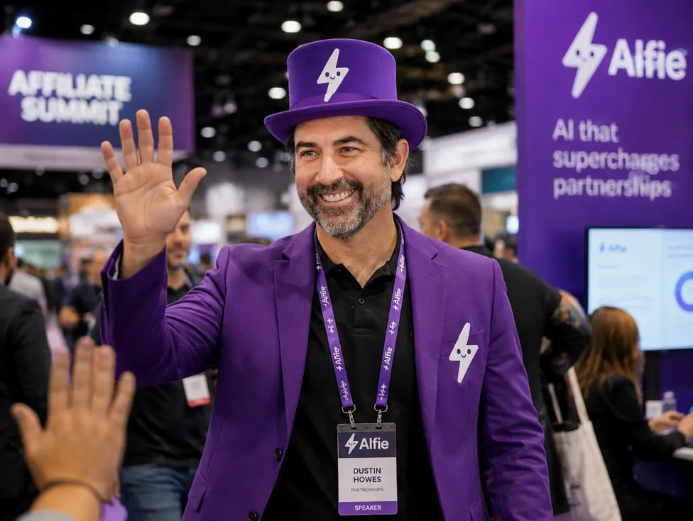Waving from the Alfie booth at Affiliate Summit