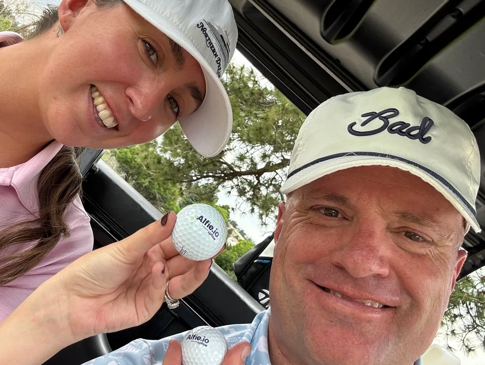 Alfie golf balls on the course