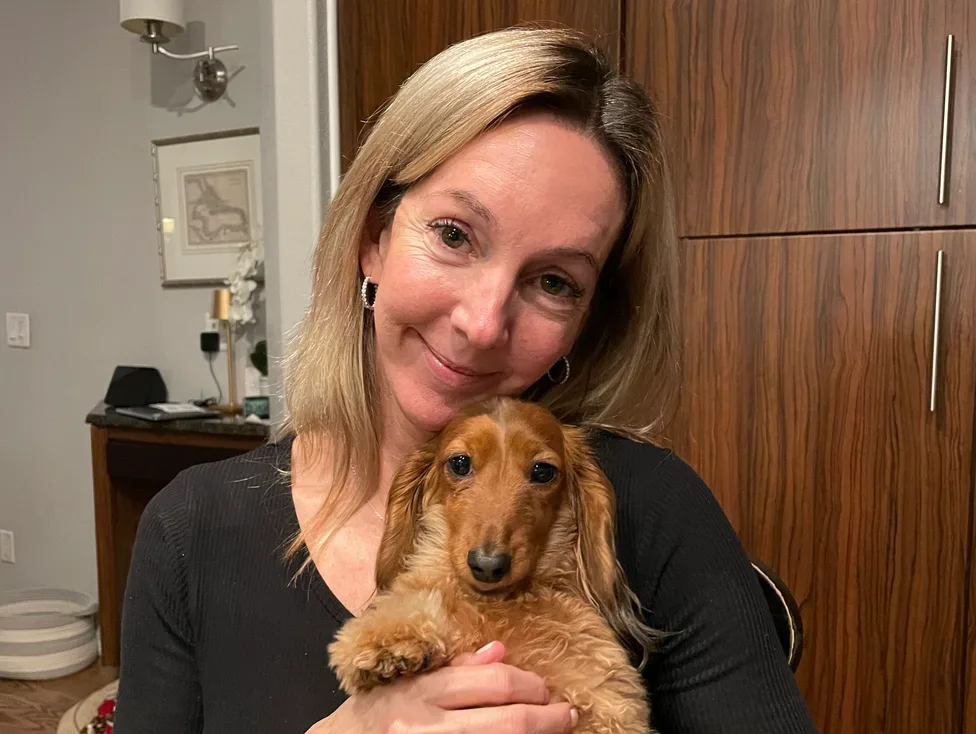 A cuddle with the dachshund